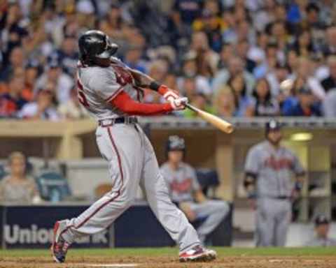 Aug 17, 2015; San Diego, CA, USA; Atlanta Braves center fielder Cameron Maybin (25) hits a solo home run during the fourth inning against the San Diego Padres at Petco Park. Mandatory Credit: Jake Roth-USA TODAY Sports