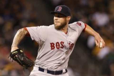 Sep 16, 2014; Pittsburgh, PA, USA; Boston Red Sox relief pitcher Drake Britton (66) pitches against the Pittsburgh Pirates during the sixth inning at PNC Park. Mandatory Credit: Charles LeClaire-USA TODAY Sports