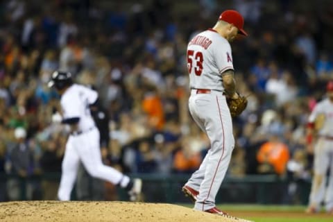 Aug 26, 2015; Detroit, MI, USA; Los Angeles Angels starting pitcher Hector Santiago (53) step off the mound after Detroit Tigers first baseman Miguel Cabrera (24) hit a two run home run in the fifth inning at Comerica Park. Mandatory Credit: Rick Osentoski-USA TODAY Sports