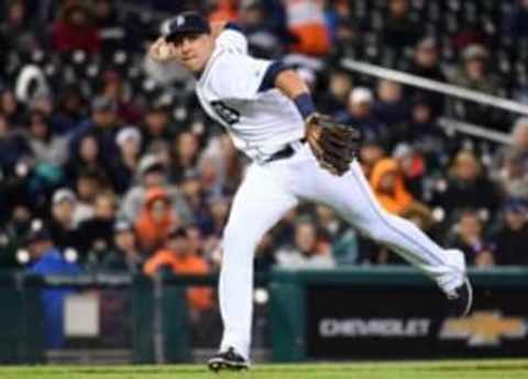 May 12, 2015; Detroit, MI, USA; Detroit Tigers second baseman Hernan Perez (26) throws to first base during the game against the Minnesota Twins at Comerica Park. Mandatory Credit: Tim Fuller-USA TODAY Sports