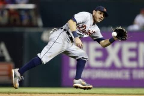 Sep 30, 2015; Arlington, TX, USA; Detroit Tigers second baseman Ian Kinsler (3) fields a ground ball in the eighth inning against the Texas Rangers at Globe Life Park in Arlington. Texas won 6-2. Mandatory Credit: Tim Heitman-USA TODAY Sports