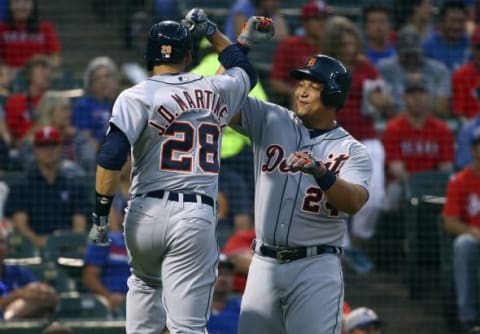 Sep 29, 2015; Arlington, TX, USA; Detroit Tigers right fielder J.D. Martinez (28) celebrates with designated hitter Miguel Cabrera (24) after hitting a two-run home run during the first inning against the Texas Rangers at Globe Life Park in Arlington. Mandatory Credit: Kevin Jairaj-USA TODAY Sports