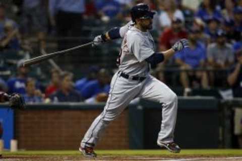 Sep 30, 2015; Arlington, TX, USA; Detroit Tigers designated hitter J.D. Martinez (28) hits a double in the first inning against the Texas Rangers at Globe Life Park in Arlington. Mandatory Credit: Tim Heitman-USA TODAY Sports