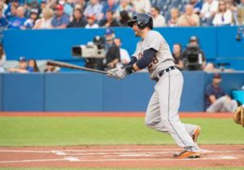 Aug 28, 2015; Toronto, Ontario, CAN; Detroit Tigers right fielder J.D. Martinez (28) reacts to a hit during the first inning in a game against the Toronto Blue Jays at Rogers Centre. The Toronto Blue Jays won 5-3. Mandatory Credit: Nick Turchiaro-USA TODAY Sports