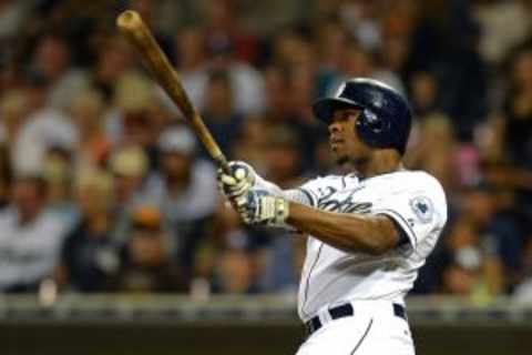 Aug 18, 2015; San Diego, CA, USA; San Diego Padres left fielder Justin Upton (10) doubles during the sixth inning against the Atlanta Braves at Petco Park. Mandatory Credit: Jake Roth-USA TODAY Sports