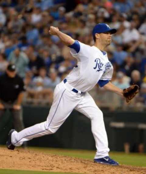 Jul 10, 2014; Kansas City, MO, USA; Kansas City Royals relief pitcher Louis Coleman (31) delivers a pitch against the Detroit Tigers in the fifth inning at Kauffman Stadium. Mandatory Credit: John Rieger-USA TODAY Sports