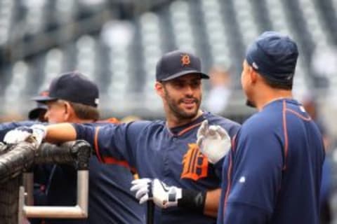 Apr 14, 2015; Pittsburgh, PA, USA; Detroit Tigers right fielder J.D. Martinez (left) talks with first baseman Miguel Cabrera (right) at the batting cage before playing the Pittsburgh Pirates at PNC Park. Mandatory Credit: Charles LeClaire-USA TODAY Sports