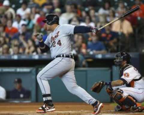 Aug 15, 2015; Houston, TX, USA; Detroit Tigers designated hitter Miguel Cabrera (24) gets a single during the first inning against the Houston Astros at Minute Maid Park. Mandatory Credit: Troy Taormina-USA TODAY Sports