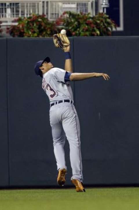 Sep 14, 2015; Minneapolis, MN, USA; Detroit Tigers left fielder Steven Moya (33) catches a fly ball in the fifth inning against the Minnesota Twins at Target Field. Mandatory Credit: Jesse Johnson-USA TODAY Sports