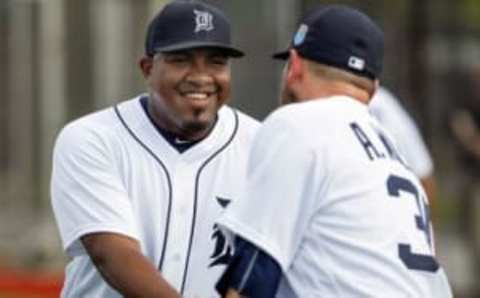 Feb 23, 2016; Lakeland, FL, USA; Detroit Tigers relief pitchers Alex Wilson (30) and Angel Nesbitt (60) shake hands during the Detroit Tigers spring training camp at Joker Merchant Stadium. Mandatory Credit: Reinhold Matay-USA TODAY Sports