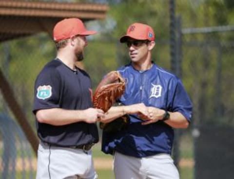 Feb 21, 2016; Lakeland, FL, USA; Detroit Tigers catcher Bryan Holaday (50) and manager Brad Ausmus (7) talk during workouts at Joker Marchant Stadium. Mandatory Credit: Kim Klement-USA TODAY Sports