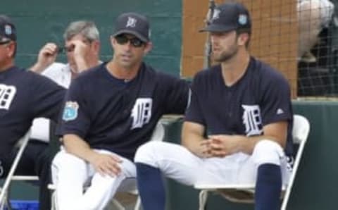 Mar 14, 2016; Lakeland, FL, USA; Detroit Tigers manager Brad Ausmus and pitcher Daniel Norris (right) talk during the third inning of a spring training baseball game against the New York Mets at Joker Marchant Stadium. Mandatory Credit: Reinhold Matay-USA TODAY Sports