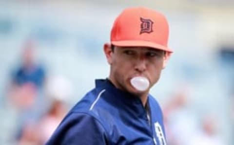 Mar 2, 2016; Tampa, FL, USA; Detroit Tigers second baseman Ian Kinsler (3) blows a bubble with his bubble gum as he works out prior to the game against the New York Yankees at George M. Steinbrenner Field. Mandatory Credit: Kim Klement-USA TODAY Sports