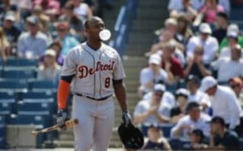 Mar 2, 2016; Tampa, FL, USA; Detroit Tigers right fielder Justin Upton (8) blows a bubble as he strikes out against the New York Yankees at George M. Steinbrenner Field. Mandatory Credit: Kim Klement-USA TODAY Sports