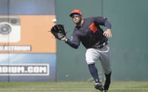 Mar 16, 2016; Kissimmee, FL, USA; Detroit Tigers left fielder Tyler Collins (18) runs in to make a catch during the sixth inning of a spring training baseball game against the Houston Astros at Osceola County Stadium. The Tigers won 7-3. Mandatory Credit: Reinhold Matay-USA TODAY Sports