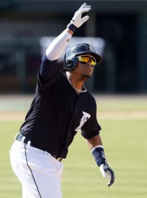 Mar 1, 2016; Lakeland, FL, USA; Detroit Tigers designated hitter Victor Martinez (41) celebrates as he rounds the bases after hitting a two run homer during the sixth inning at Joker Marchant Stadium. Mandatory Credit: Butch Dill-USA TODAY Sports