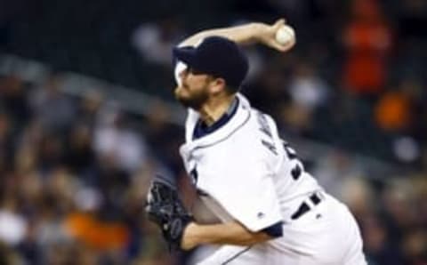 Apr 27, 2016; Detroit, MI, USA; Detroit Tigers relief pitcher Alex Wilson (30) pitches in the seventh inning against the Oakland Athletics at Comerica Park. Mandatory Credit: Rick Osentoski-USA TODAY Sports