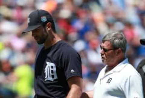 Mar 22, 2016; Lakeland, FL, USA; Detroit Tigers starting pitcher Daniel Norris (44) is taken out of the game during the first inning and walks to the clubhouse with trainer Kevin Rand against the Toronto Blue Jays at Joker Marchant Stadium. Mandatory Credit: Kim Klement-USA TODAY Sports