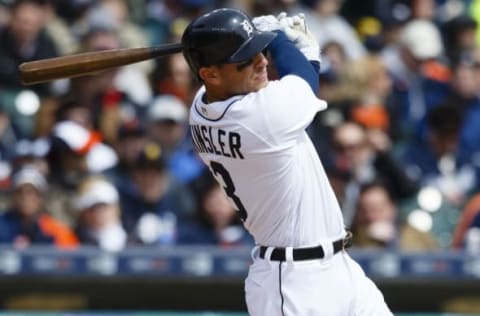 Apr 8, 2016; Detroit, MI, USA; Detroit Tigers second baseman Ian Kinsler (3) hits a double in the first inning against the New York Yankees at Comerica Park. Mandatory Credit: Rick Osentoski-USA TODAY Sports