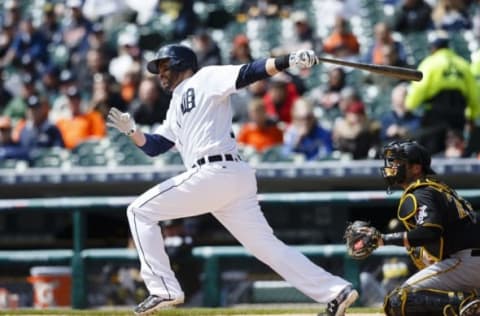 Apr 12, 2016; Detroit, MI, USA; Detroit Tigers right fielder J.D. Martinez (28) hits an RBI single in the first inning against the Pittsburgh Pirates at Comerica Park. Mandatory Credit: Rick Osentoski-USA TODAY Sports