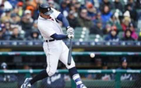 Apr 9, 2016; Detroit, MI, USA; Detroit Tigers catcher James McCann (34) hits an two RBI single in the fourth inning against the New York Yankees at Comerica Park. Mandatory Credit: Rick Osentoski-USA TODAY Sports