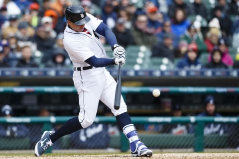 Apr 9, 2016; Detroit, MI, USA; Detroit Tigers catcher James McCann (34) hits an two RBI single in the fourth inning against the New York Yankees at Comerica Park. Mandatory Credit: Rick Osentoski-USA TODAY Sports