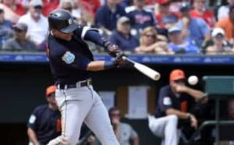 Mar 18, 2016; Jupiter, FL, USA; Detroit Tigers shortstop Jose Iglesias (1) hits a double against the St. Louis Cardinals during the game at Roger Dean Stadium. The Tigers defeated the Cardinals 2-0. Mandatory Credit: Scott Rovak-USA TODAY Sports