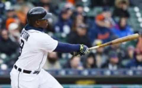 Apr 9, 2016; Detroit, MI, USA; Detroit Tigers left fielder Justin Upton (8) hits a double in the seventh inning against the New York Yankees at Comerica Park. Mandatory Credit: Rick Osentoski-USA TODAY Sports