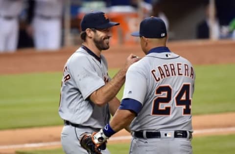 Apr 5, 2016; Miami, FL, USA; Detroit Tigers first baseman Miguel Cabrera (right) greets Tigers starting pitcher Justin Verlander (left) during the sixth inning against the Miami Marlins at Marlins Park. Mandatory Credit: Steve Mitchell-USA TODAY Sports