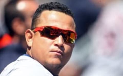 Apr 14, 2016; Pittsburgh, PA, USA; Detroit Tigers first baseman Miguel Cabrera (24) looks on from the dugout against the Pittsburgh Pirates during the third inning in an inter-league game at PNC Park. Mandatory Credit: Charles LeClaire-USA TODAY Sports