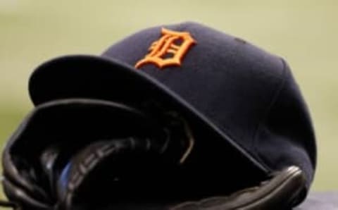 Aug 20, 2014; St. Petersburg, FL, USA; Detroit Tigers hat and glove in the dugout against the Tampa Bay Rays at Tropicana Field. Mandatory Credit: Kim Klement-USA TODAY Sports