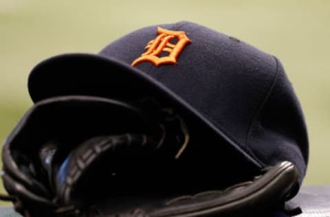 Aug 20, 2014; St. Petersburg, FL, USA; Detroit Tigers hat and glove in the dugout against the Tampa Bay Rays at Tropicana Field. Mandatory Credit: Kim Klement-USA TODAY Sports