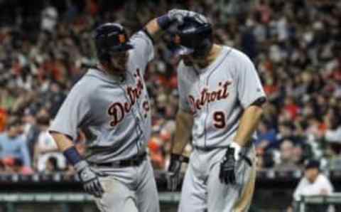 Apr 16, 2016; Houston, TX, USA; Detroit Tigers catcher Jarrod Saltalamacchia (39) celebrates with third baseman Nick Castellanos (9) after hitting a home run during the sixth inning against the Houston Astros at Minute Maid Park. Mandatory Credit: Troy Taormina-USA TODAY Sports