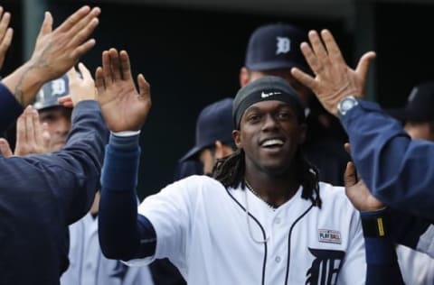 May 16, 2016; Detroit, MI, USA; Detroit Tigers center fielder Cameron Maybin (4) receives congratulations from teammates after scoring in the first inning against the Minnesota Twins at Comerica Park. Mandatory Credit: Rick Osentoski-USA TODAY Sports