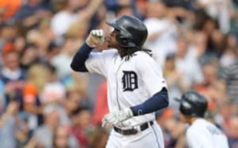 May 21, 2016; Detroit, MI, USA; Detroit Tigers center fielder Cameron Maybin (4) celebrates after hitting his first major league home run in the third inning of the game against the Tampa Bay Rays at Comerica Park. Mandatory Credit: Leon Halip-USA TODAY Sports