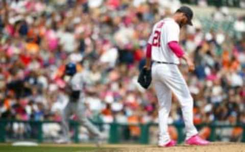 May 8, 2016; Detroit, MI, USA; Detroit Tigers relief pitcher Mark Lowe (21) reacts on the mound as Texas Rangers center fielder Delino DeShields (3) runs the bases after he hits a home run in the eighth inning at Comerica Park. Mandatory Credit: Rick Osentoski-USA TODAY Sports