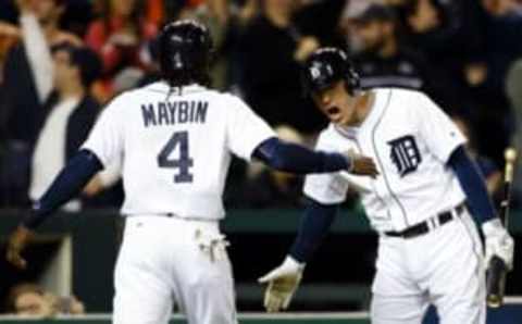 May 17, 2016; Detroit, MI, USA; Detroit Tigers center fielder Cameron Maybin (4) receives congratulations from second baseman Ian Kinsler (3) after scoring in the seventh inning against the Minnesota Twins at Comerica Park. Mandatory Credit: Rick Osentoski-USA TODAY Sports