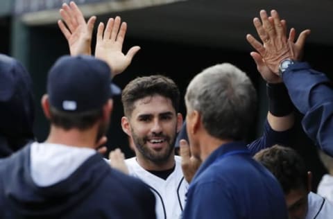 May 16, 2016; Detroit, MI, USA; Detroit Tigers right fielder J.D. Martinez (28) receives congratulations from teammates after scoring in the first inning against the Minnesota Twins at Comerica Park. Mandatory Credit: Rick Osentoski-USA TODAY Sports