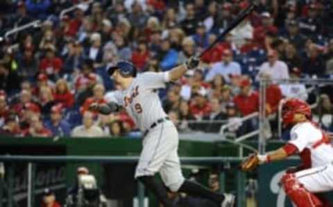 May 10, 2016; Washington, DC, USA; Detroit Tigers third baseman Nick Castellanos (9) hits a two run home run against the Washington Nationals during the fourth inning at Nationals Park. Mandatory Credit: Brad Mills-USA TODAY Sports