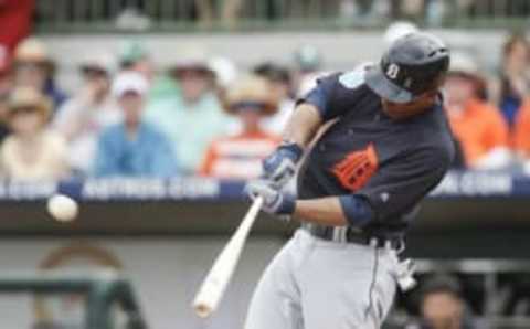 Mar 11, 2016; Kissimmee, FL, USA; Detroit Tigers left fielder Steven Moya (33) hits an RBI double in the third inning of a spring training baseball game against the Houston Astros at Osceola County Stadium. Mandatory Credit: Reinhold Matay-USA TODAY Sports