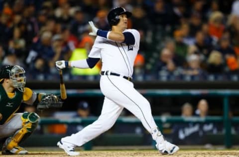 Apr 27, 2016; Detroit, MI, USA; Detroit Tigers designated hitter Victor Martinez (41) hits a three run home run in the sixth inning against the Oakland Athletics at Comerica Park. Mandatory Credit: Rick Osentoski-USA TODAY Sports