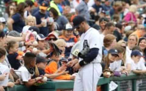 May 21, 2016; Detroit, MI, USA; Detroit Tigers right fielder J.D. Martinez (28) signs fans autographs prior to the star of the game against the Tampa Bay Rays at Comerica Park. Mandatory Credit: Leon Halip-USA TODAY Sports