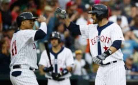 Jun 4, 2016; Detroit, MI, USA; Detroit Tigers right fielder J.D. Martinez (28) celebrates his two run home run in the sixth inning with designated hitter Victor Martinez (41) against the Chicago White Sox at Comerica Park. Mandatory Credit: Rick Osentoski-USA TODAY Sports