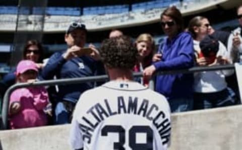 Apr 23, 2016; Detroit, MI, USA; Detroit Tigers catcher Jarrod Saltalamacchia (39) signs autographs for fans before a game against the Cleveland Indians at Comerica Park. Mandatory Credit: Aaron Doster-USA TODAY Sports