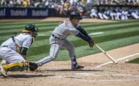 May 28, 2016; Oakland, CA, USA; Detroit Tigers shortstop Jose Iglesias (1) hits a ground ball during the fifth inning against the Oakland Athletics at Oakland Coliseum. Mandatory Credit: Kenny Karst-USA TODAY Sports