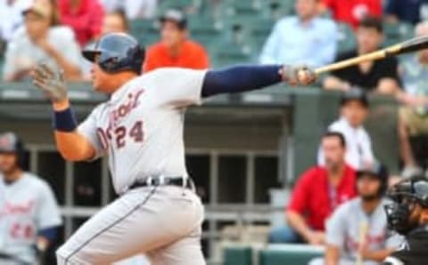 Jun 13, 2016; Chicago, IL, USA; Detroit Tigers first baseman Miguel Cabrera (24) hits an RBI triple during the first inning against the Chicago White Sox at U.S. Cellular Field. Mandatory Credit: Caylor Arnold-USA TODAY Sports