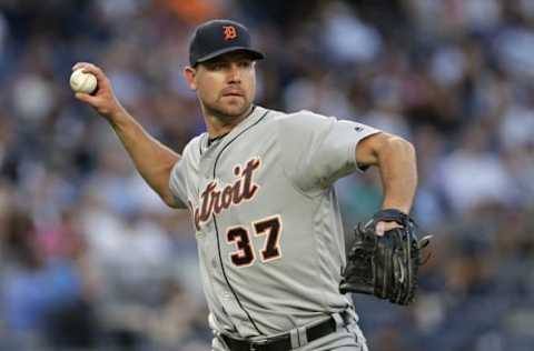 Jun 10, 2016; Bronx, NY, USA; Detroit Tigers starting pitcher Mike Pelfrey (37) throws to first base against the New York Yankees during the second inning at Yankee Stadium. Mandatory Credit: Adam Hunger-USA TODAY Sports