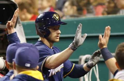 May 5, 2016; Cincinnati, OH, USA; Milwaukee Brewers right fielder Alex Presley is congratulated after hitting a two-run home run against the Cincinnati Reds during the eighth inning at Great American Ball Park. The Reds won 9-5. Mandatory Credit: David Kohl-USA TODAY Sports