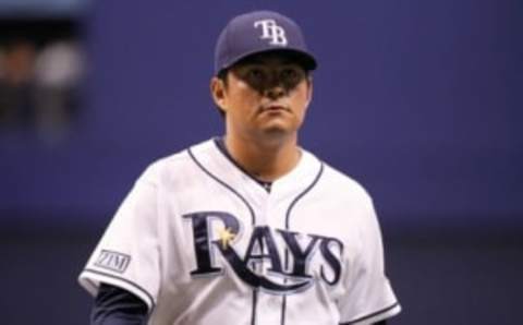 Aug 20, 2014; St. Petersburg, FL, USA; Tampa Bay Rays relief pitcher Cesar Ramos (27) walks back to the dugout at the end of the inning against the Detroit Tigers at Tropicana Field. Detroit Tigers defeated the Tampa Bay Rays 6-0. Mandatory Credit: Kim Klement-USA TODAY Sports