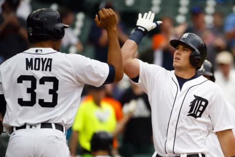 Jun 23, 2016; Detroit, MI, USA; Detroit Tigers catcher James McCann (34) receives congratulations from right fielder Steven Moya (33) after he hits a two run home run in the fourth inning against the Seattle Mariners at Comerica Park. Mandatory Credit: Rick Osentoski-USA TODAY Sports